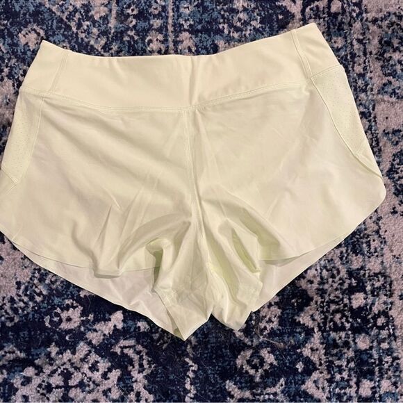 Athleta yellow green run with it short 3.5” L - Picture 2 of 4
